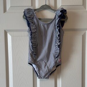 RuffleButts Girls Navy Stripe Waterfall One Piece swimsuit